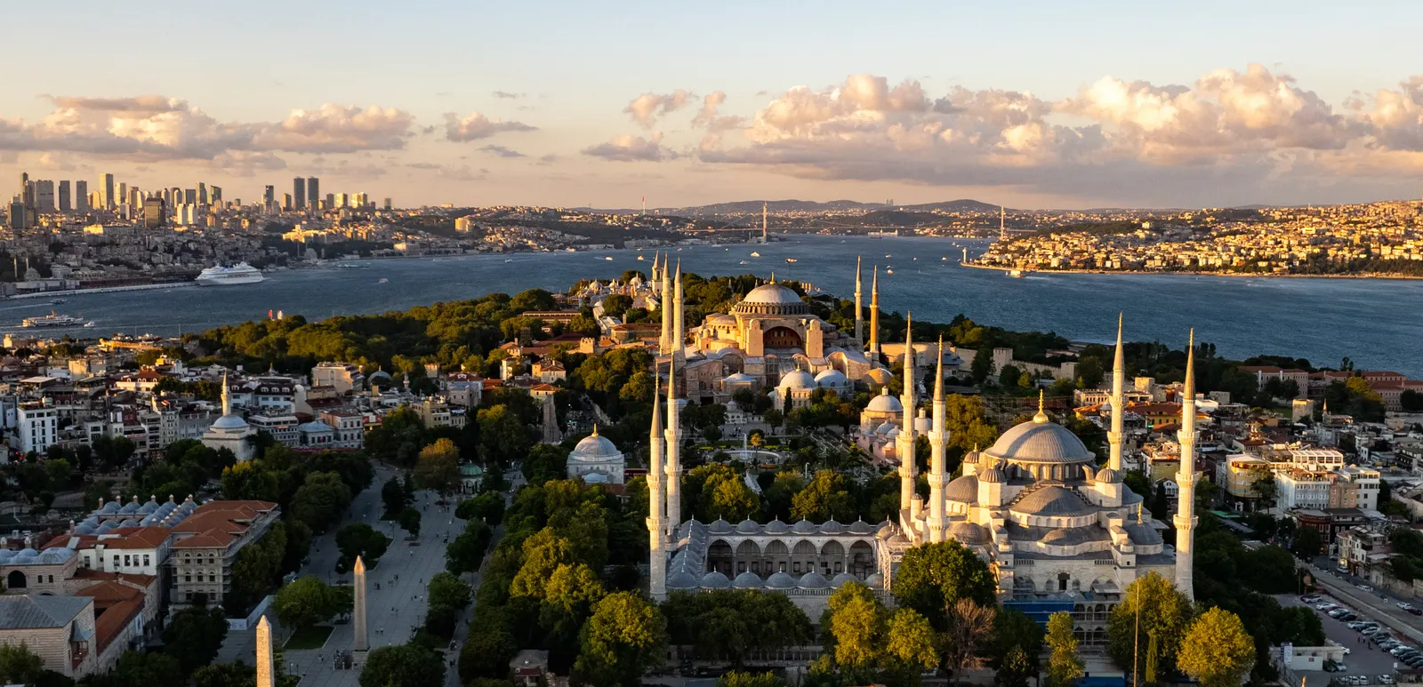 View over Istanbul's old town with the Blue Mosque, Hagia Sophia and the Bosphorus at golden hour